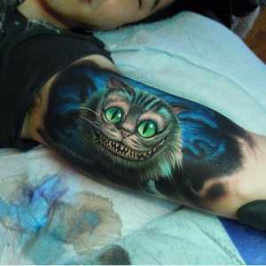 „Cheshire Mačka” - tetovaža s pozitivnim vrijednost za optimističnih ljudi